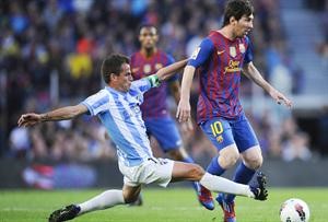 ميسي يقود هجوم برشلونة امام ملقة في الليغا