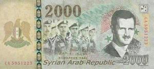 الأسد يضع صورته على فئة الـ 2000 ليرة المطبوعة في روسيا.. وصحفه تهاجم العربي وتصفه بـ «الأجير» 