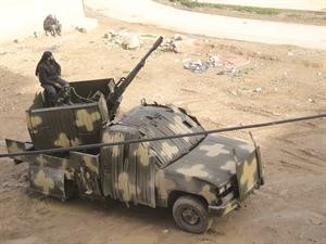 صورة بثها ناشطون لاحد عناصر الجيش الحر التي تحاصر مطار كويرس 