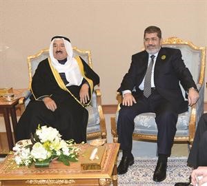 صاحب السمو الامير الشيخ صباح الاحمد مستقبلا الرئيس المصري دمحمد مرسي
