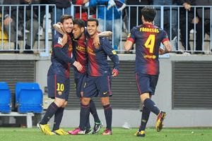 فرحة لاعبي برشلونة ميسي وبيدرو والفيس وفابريغاس بالفوز على ملقة افپ
