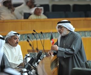 عدنان عبدالصمد ودعبدالحميد دشتي
