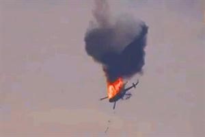 صورة بثها ناشطون لاحدى المروحيات التي اسقطها الجيش الحر في حلب امس 