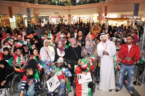 فريق الانباء مع المشاركين وكبار السن والاطفال 	محمد خلوصيانور الكندري