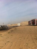 سيارات الاطفاء تحيط بموقع المخيم﻿