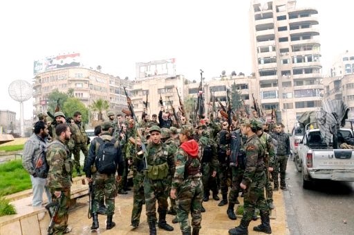 معارك عنيفة بين «النظامي» و«الحر» في الغوطة الشرقية  وقوات الأسد ترتكب مجزرة في حمص وتقصف حلب بـ «سكود»