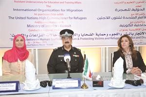 ايمان عريقات واللواء حميد السماك ودحنان حمدان خلال الورشة	محمد خلوصي﻿