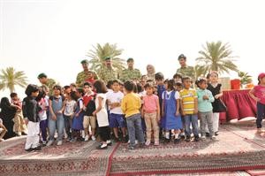 عناصر الحرس الوطني شاركوا اطفال روضة النماء الاحتفال بعيد الاسرة﻿