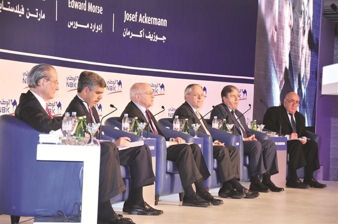  ابراهيم دبدوب وضيوف ندوة البنك الوطني السنوية اعضاء المجلس الاستشاري الدولي من اليمين جوزيف اكرمان ومارتن فيلدستاين وادوارد مورس ووليام رودز ومحمد العريان 	محمد خلوصي﻿