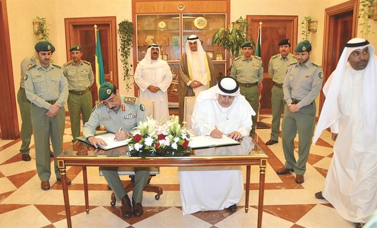 الفريق ناصر الدعي وعبدالعزيز الخالدي يوقعان بروتوكول التعاون﻿