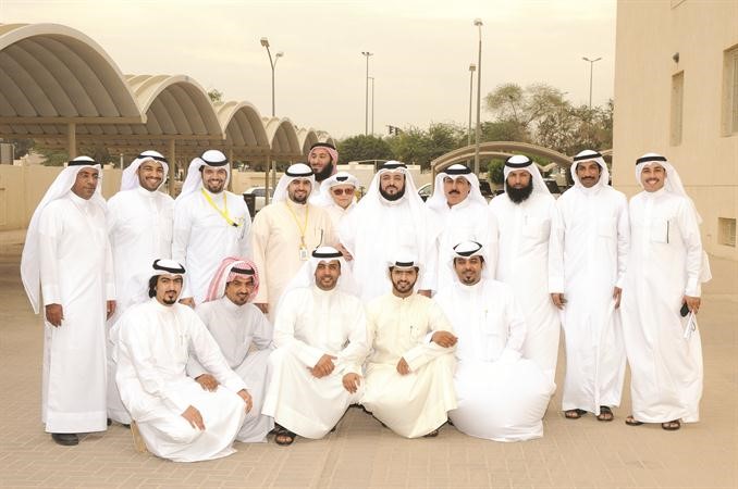 ممدوح العنزي مع عدد من المكرمين