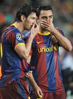 ميسي وتشافي قادا برشلونة لتحقيق الليغا