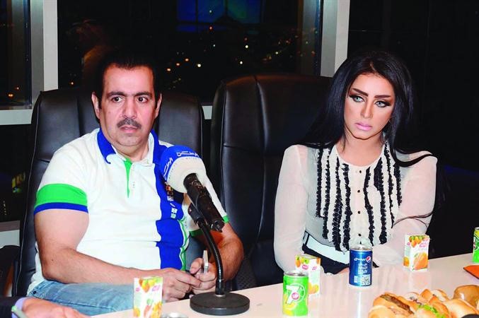 عادل المسلم والبحرينية المهرة في المؤتمر