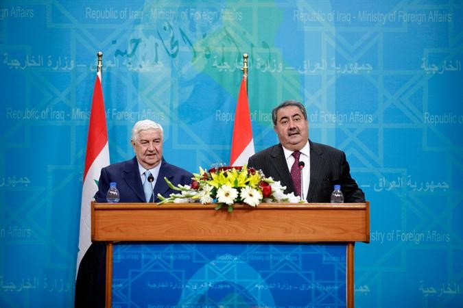وزيرا خارجية سورية والعراق وليد المعلم وهوشيار زيباري رويترز
