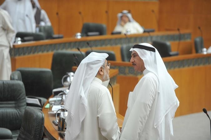 عدنان عبدالصمد وعدنان المطوع
