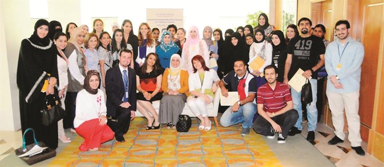 لقطة تذكارية للمشاركين في ورشة العمل﻿