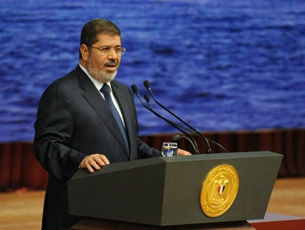 الرئيسمرسي متحدثا خلال المؤتمر الوطني للتعامل مع سد النهضة امس الاولاپ