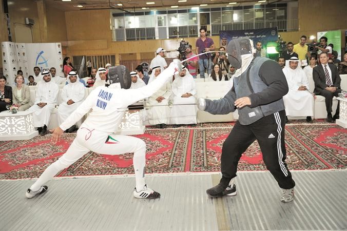 القلاف يستعرض مع مدربه كاظم مال الله