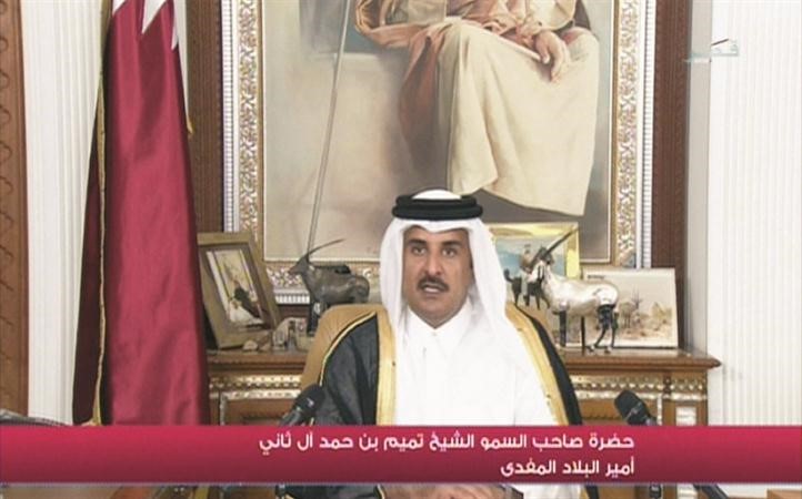 امير قطر صاحب السمو الشيخ تميم بن حمد بن خليفة يلقي خطابه امس من التلفزيون	 افپ