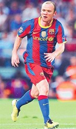 صورة مركبة لروني بقميص برشلونة﻿