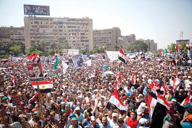 ومؤيدو الرئيس مرسي في ميدان رابعة العدوية امس اپ