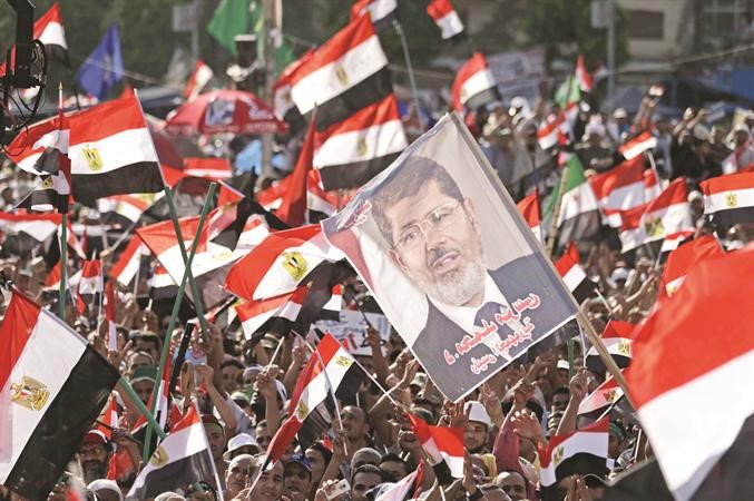 مؤيدو الرئيس مرسي في تجمع لهم في رابعة العدوية امس ا پ