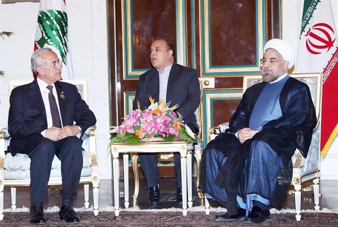 الرئيس الايراني حسن روحاني مستقبلا الرئيس اللبناني ميشال سليمان في طهران محمود الطويل