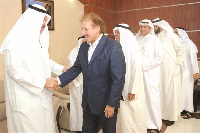 الفنان محمد المنصور والزميل منصور الهاجري يهنئان