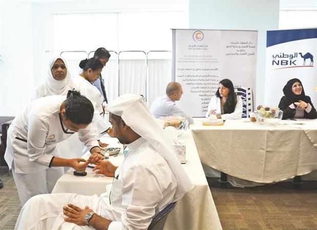 الوطني يهتم بصحة موظفيه﻿