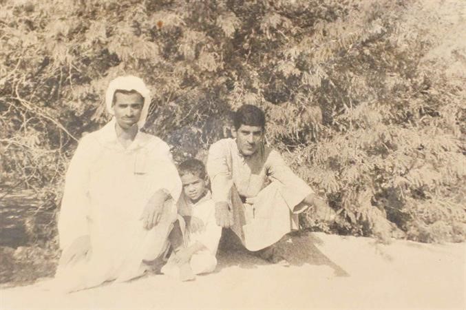 علي الراشد وبسام الربيعي وطفل