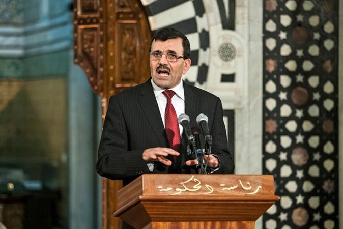 رئيس الوزراء التونسي علي العريض خلال مؤتمره الصحافي امس الاول اپ 