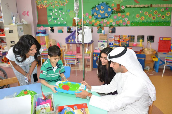 اسرة البنك الوطني تشارك الاطفال فرحة العيد