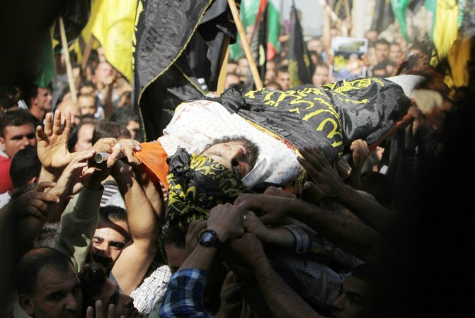 فلسطينيون يشيعون جثمانمحمد عاصي القيادي بـالجهاد الاسلامي الذي اغتالته قوات الاحتلال امس الاول 	افپ