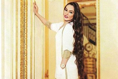 "شيريهان" تكشف عن صورة قديمة منحتها لقب "الأجمل"               
