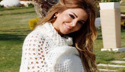 رزان مغربي تضطر للسفر إلى لندن بسب جنينها