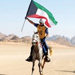 فارس كويتي يرفع العلم عاليا ﻿