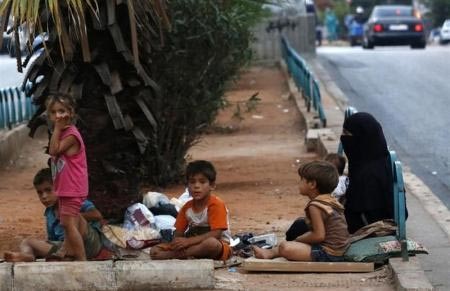 الأمم المتحدة تطلب مساعدات حجمها 12.9 مليار دولار لعام 2014 نصفها لسوريا