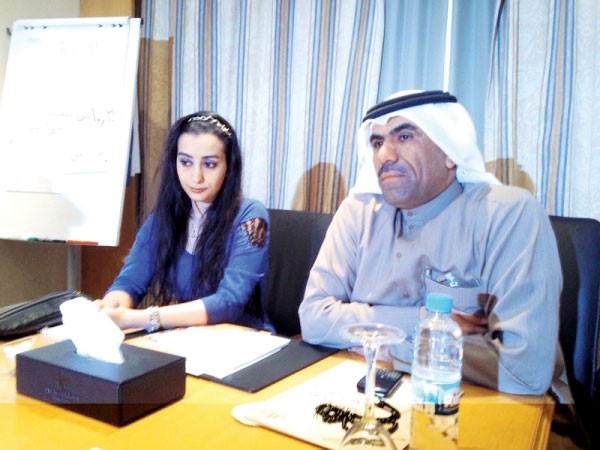 لمى ناصر والزميل مفرح الشمري في المؤتمر﻿