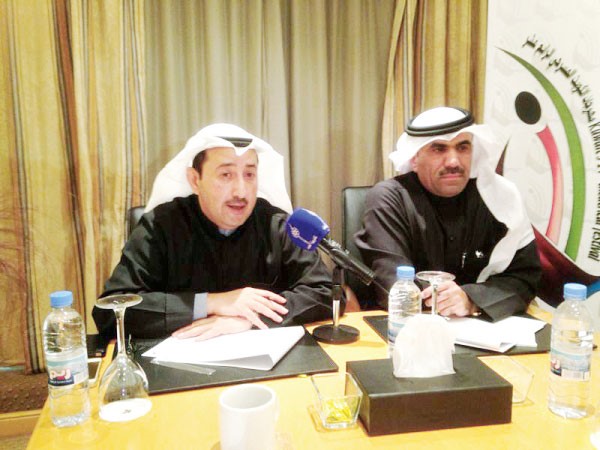محمد العسعوسي ورئيس المركز الاعلامي الزميل مفرح الشمري في المؤتمر﻿