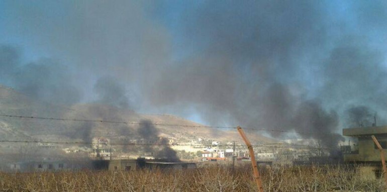 سماء بلدة الصويري في البقاع الغربي والدخان يتصاعد منها بعد اشتباكات محمود الطويل