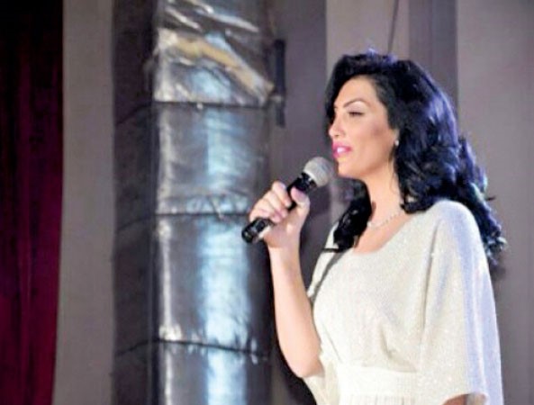 حورية اثناء تقديم البرنامج﻿