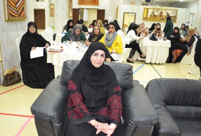 نجاة الرويشد مع المديرات اثناء الورشة