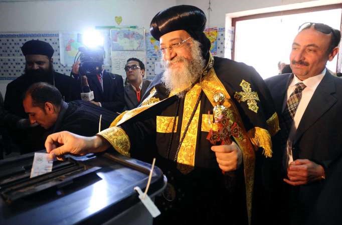  والبابا تواضروس الثاني يدلي بصوته في الاستفتاء على الدستور امس	افپ﻿