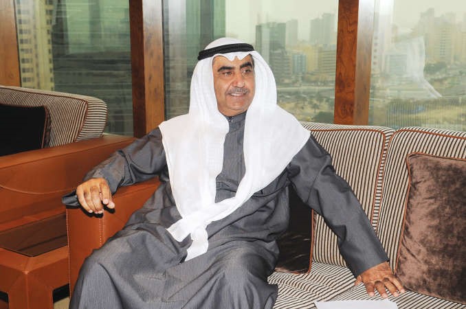 رئيس شركة بيت الاوراق المالية ايمن بودي ويبدو متفائلا من قدرته على تجاوز اصعب ازمة مالية		 قاسم باشا﻿