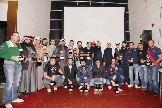 المضف مع الفائزين والمكرمين 	محمد خلوصي﻿
