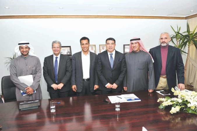 لقطة جماعية للوزير مبديع والوفد المرافق له خلال توقيع اتفاقية التعاون مع المعهد العربي للتخطيط هاني عبدالله