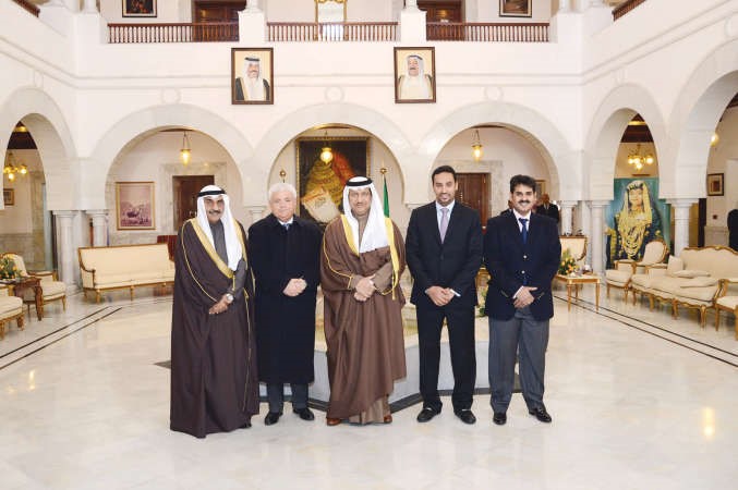 ممثل صاحب السمو الامير والسفير فهد العوضي مع اعضاء السفارة التونسية 