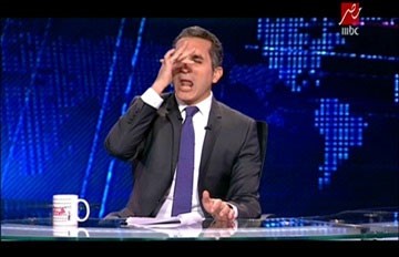  بالفيديو.. باسم يوسف يطلق "زغرودة" بعد تأكيد ترشح السيسى للرئاسة.. و النائب العام يأمر بالتحقيق في اتهامه بإهانة مصطفى بكري 