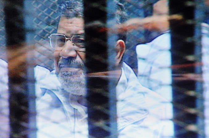 صورة ارشيفية لمحاكمة الرئيس المعزول محمد مرسي بتاريخ 16 الجاري	اپ﻿