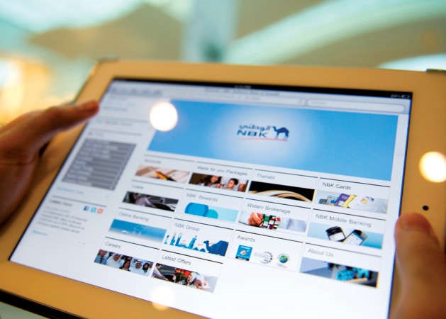 خدمات «الوطني» الهاتفية والإلكترونية تعمل بإجازة الأعياد